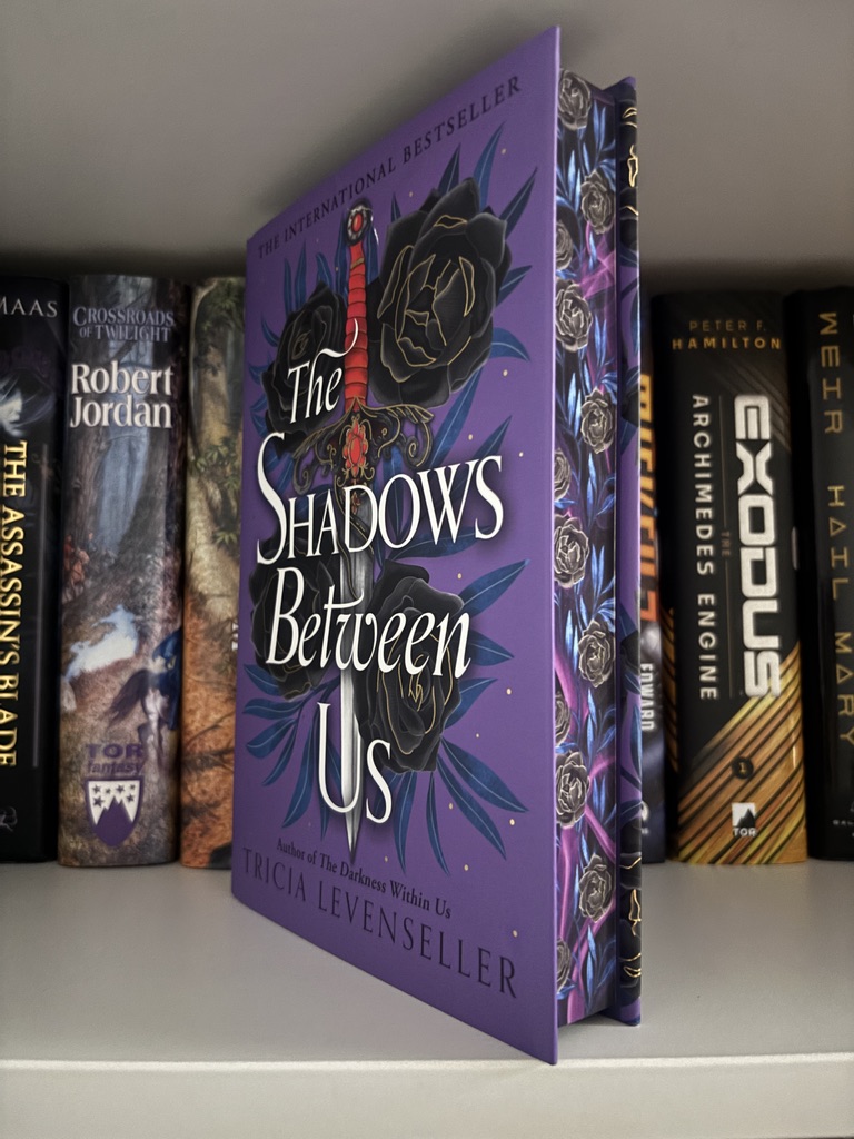 Signed the Shadow Between Us by Tricia Levenseller - Fairyloot
